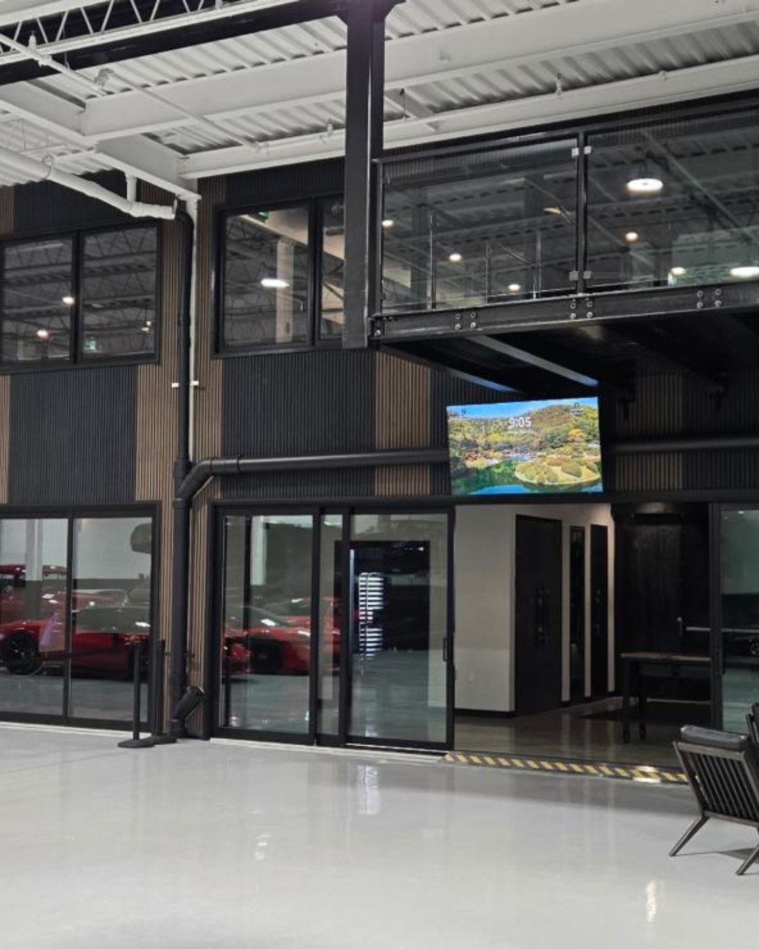 Multi-panel stacking sliding door system for open-concept commercial space.