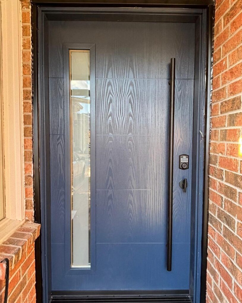 Custom blue fiberglass entry door with vertical glass insert. (2)