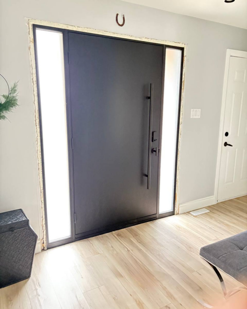 Black fiberglass entry door Winnipeg project – a modern upgrade for a brick entrance