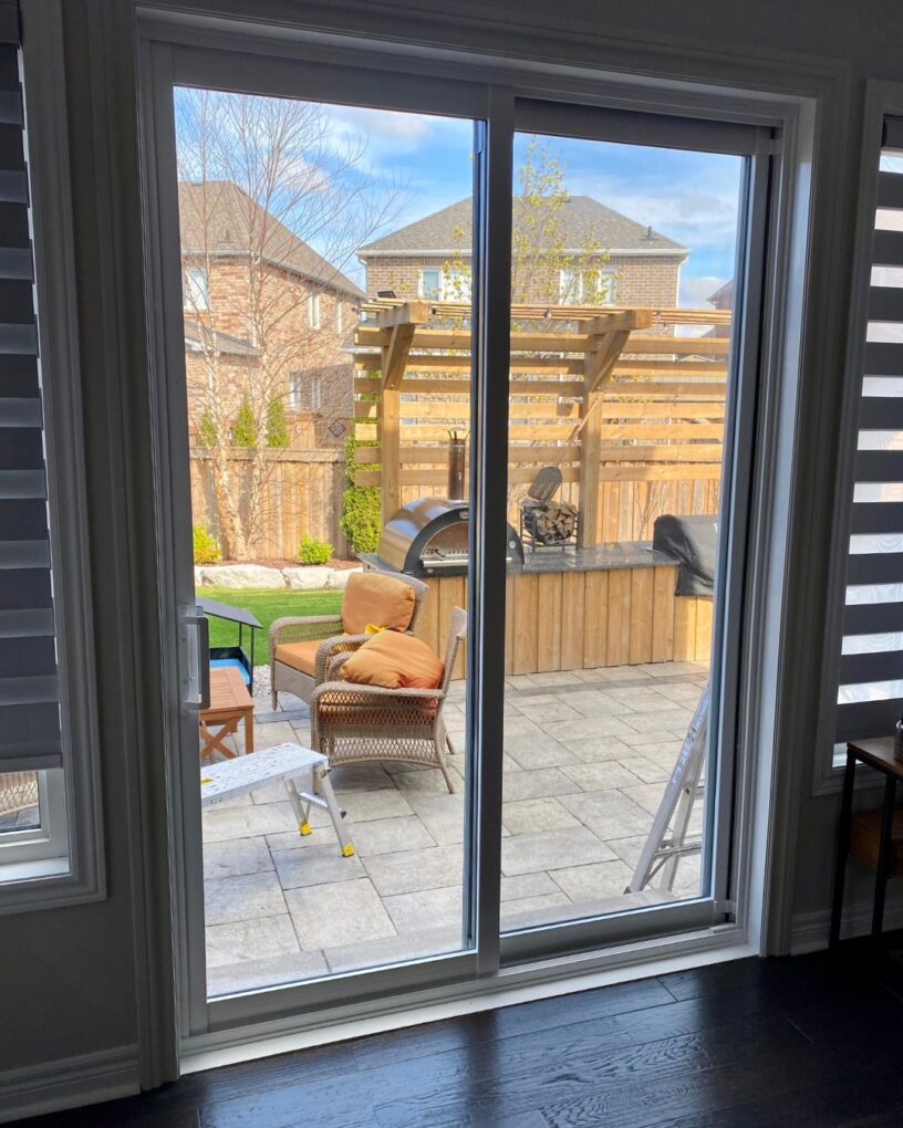 Black 2 panel sliding doors bringing more light into a Toronto interior