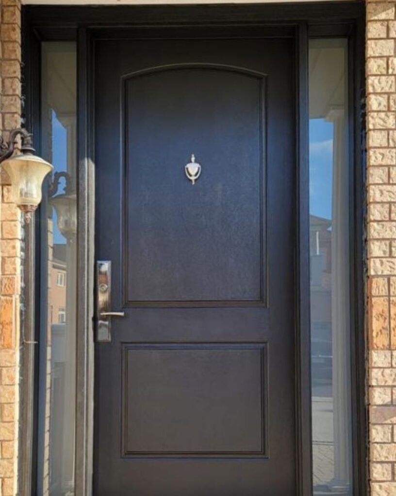 Black fiberglass entry doors with modern woodgrain finish