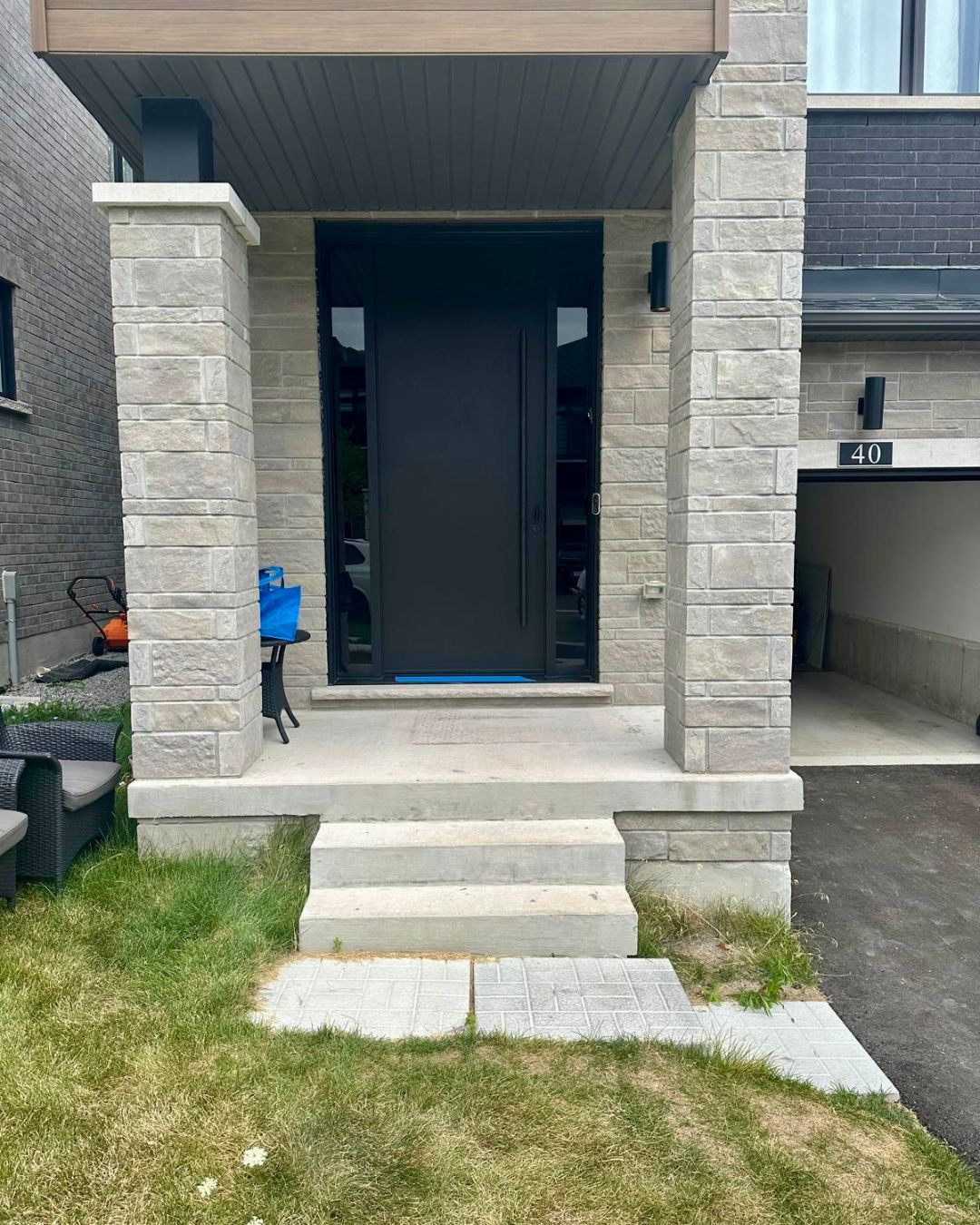 Fiberglass front door with double grey glass sidelights