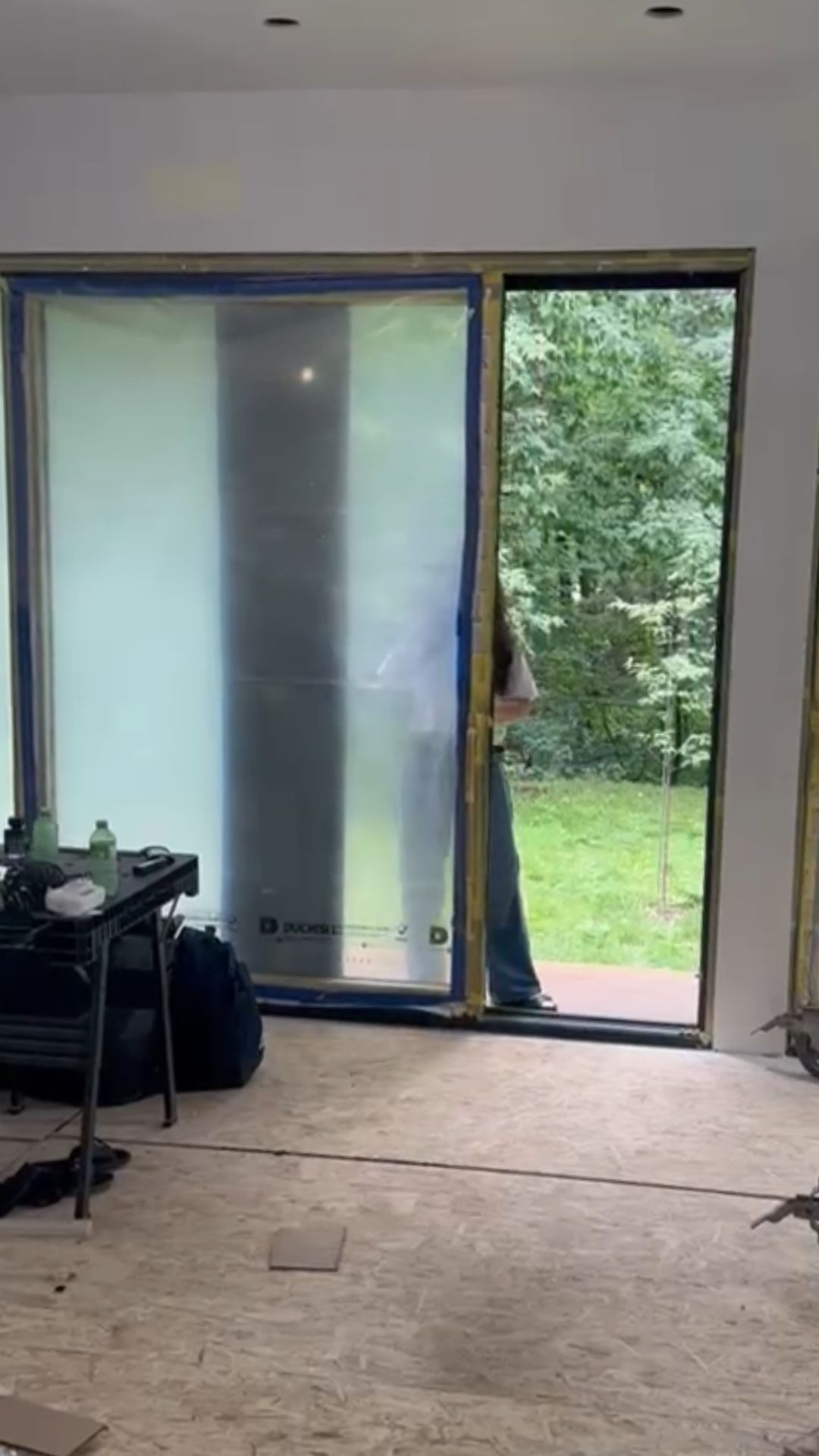 Custom black European lift and slide door system with large glass panels